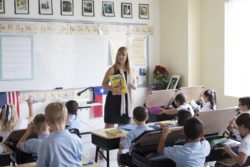 A teacher giving lessons to the class